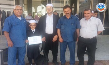 تكريم الطالب " أيمن عباس " من طرف معالي وزيرة التربية الوطنية والأمينة العامة لمشروع تحدي القراءة العربي